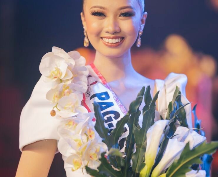 Beauty Queen Holding a Flower