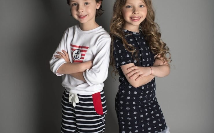 Two Boy and Girl Standing Wearing Clothes brothers children