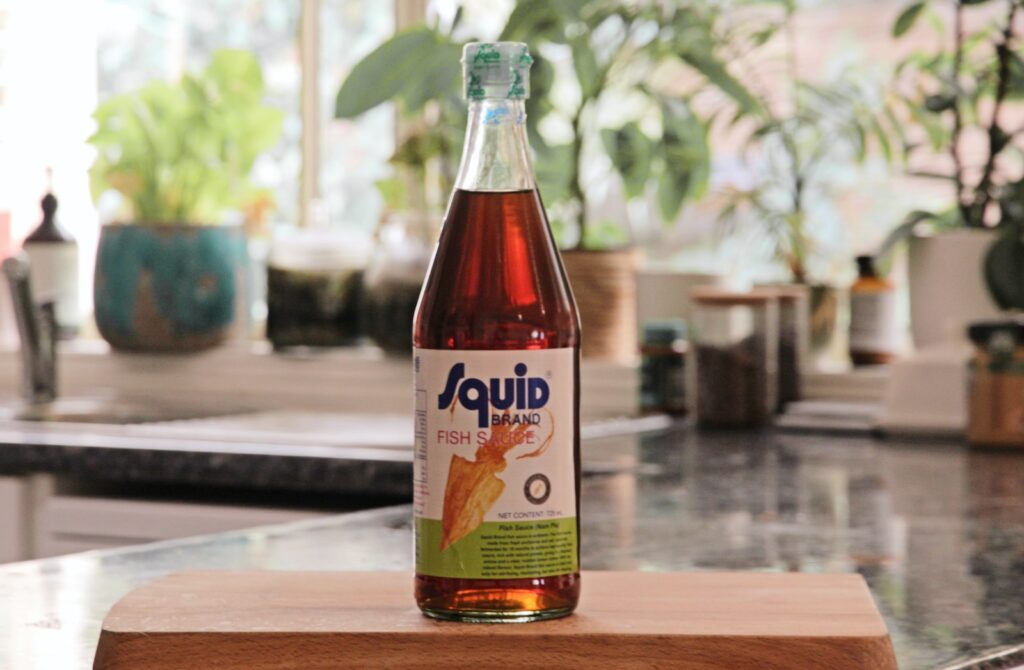 a bottle of liquid sitting on top of a counter