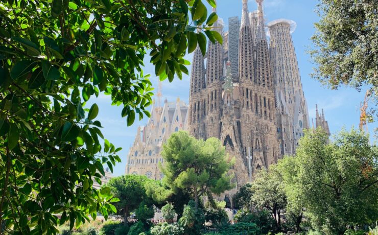 green trees near brown concrete building during daytime church sagrada familia gaudì barcelona spain catalunya