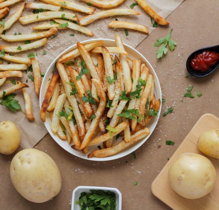 french fries, ketchup, potatoes