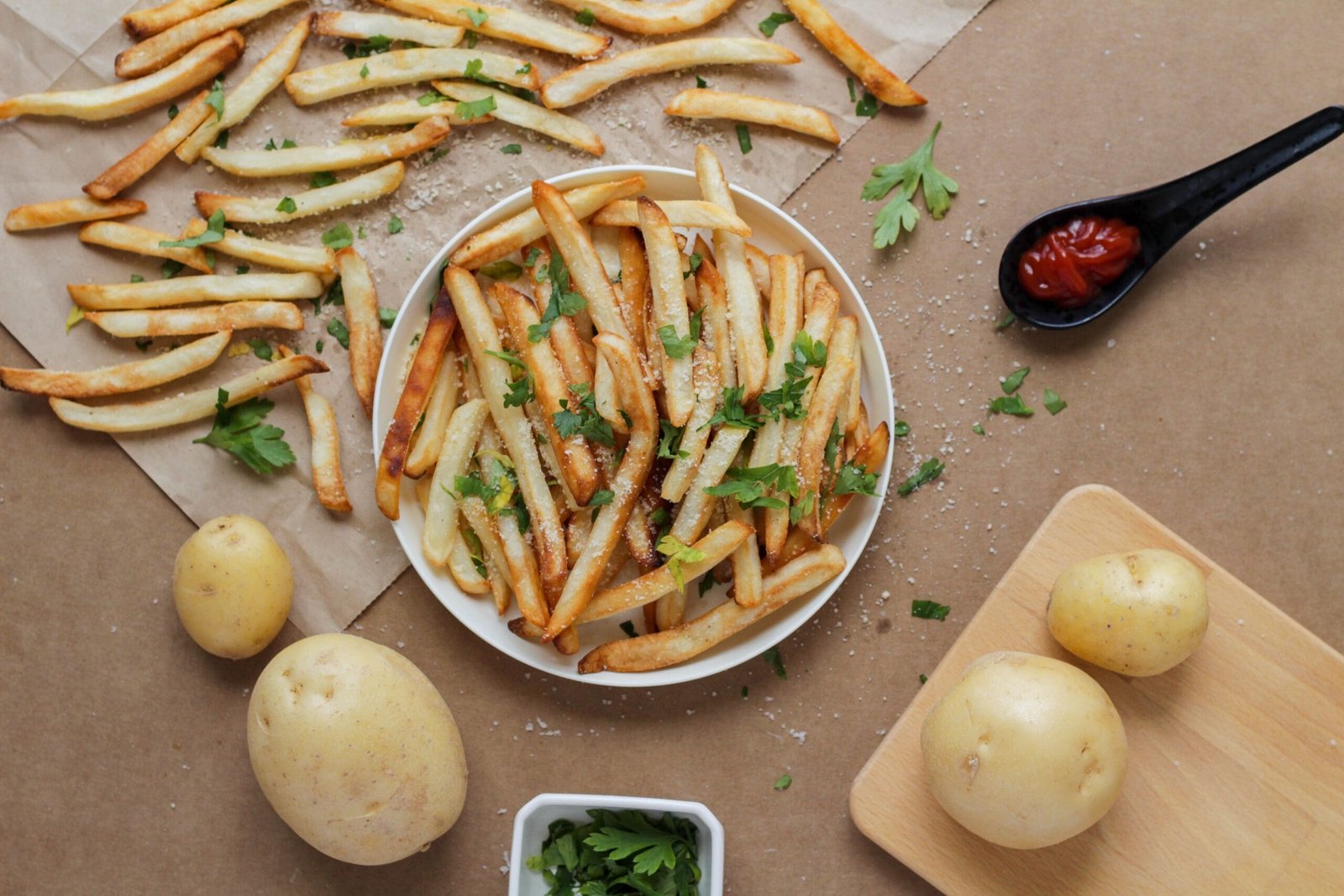 french fries, ketchup, potatoes