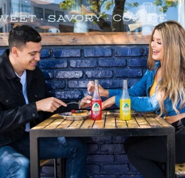 man and woman sitting at table