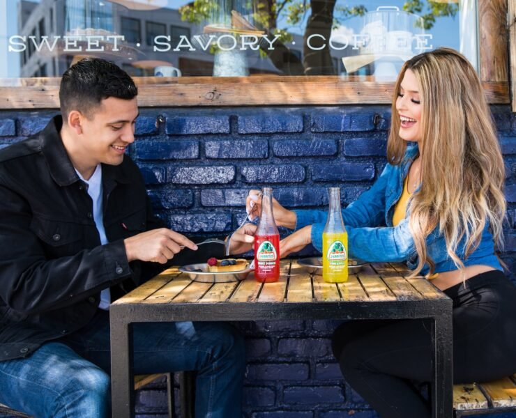 man and woman sitting at table