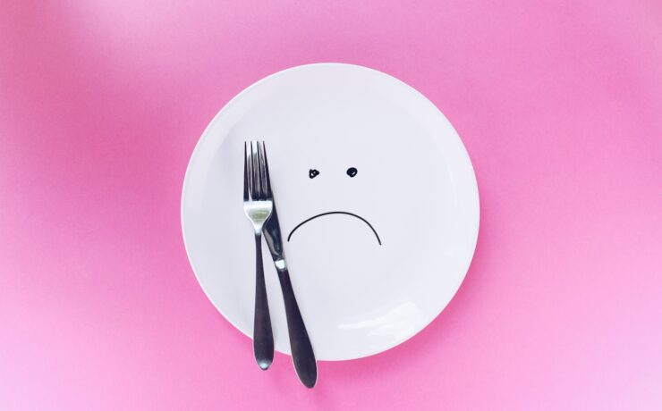 silver fork and knife on plate