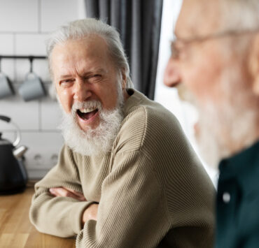 old people laughing friends