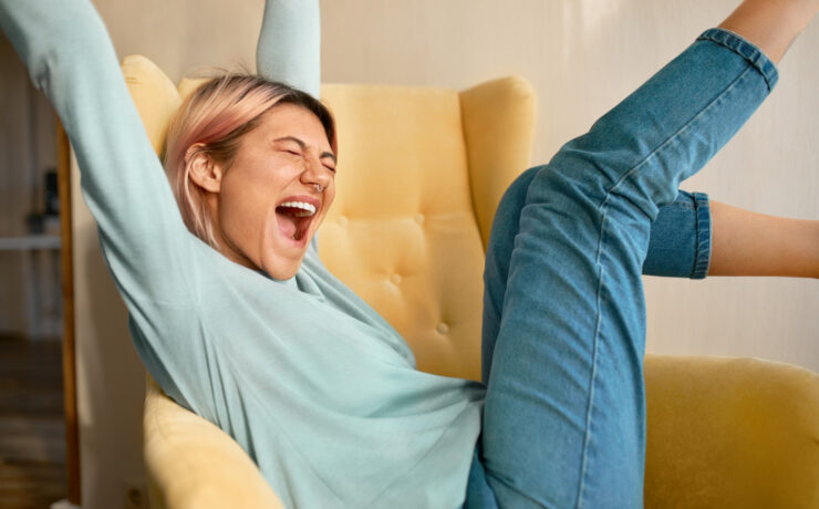 young woman screaming for happiness