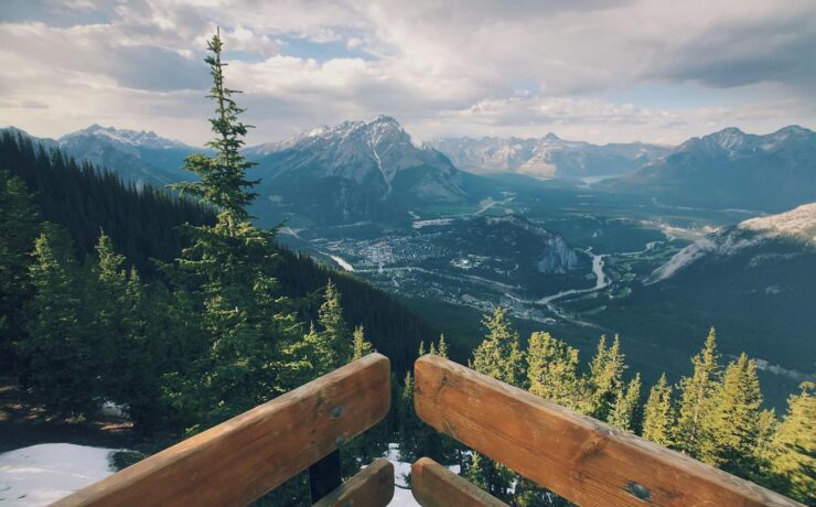 Breathtaking view of Banff National Park with mountains and evergreen trees.