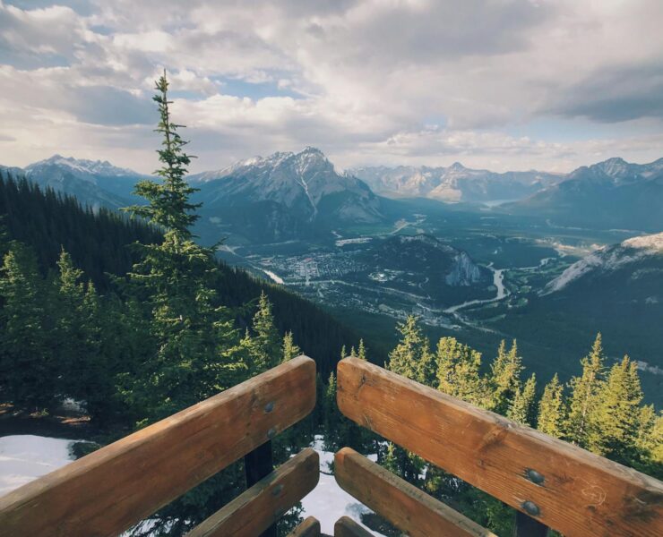 Breathtaking view of Banff National Park with mountains and evergreen trees.