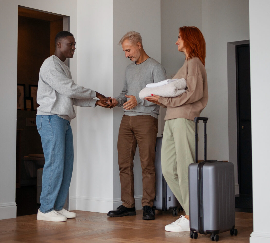 friends arriving at a guesthouse