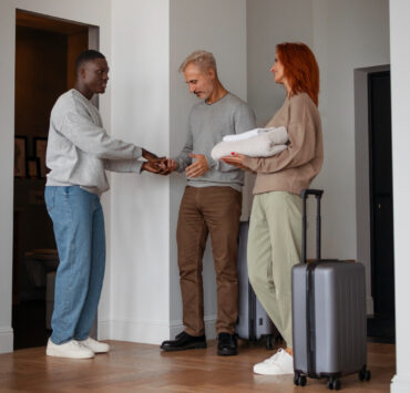 friends arriving at a guesthouse