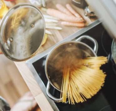 cooking pasta in the kitchen