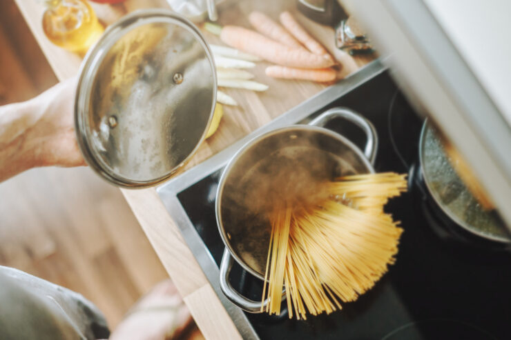 cooking pasta in the kitchen