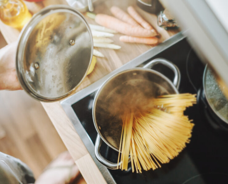 cooking pasta in the kitchen