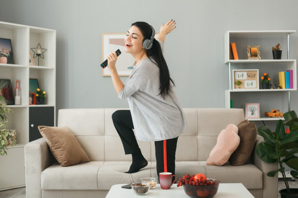 girl singing at home