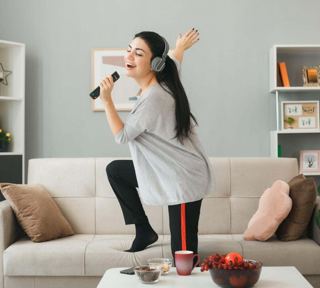 girl singing at home