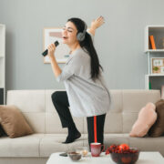 girl singing at home