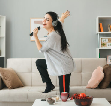 girl singing at home