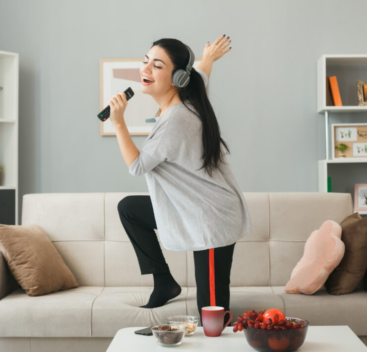 girl singing at home