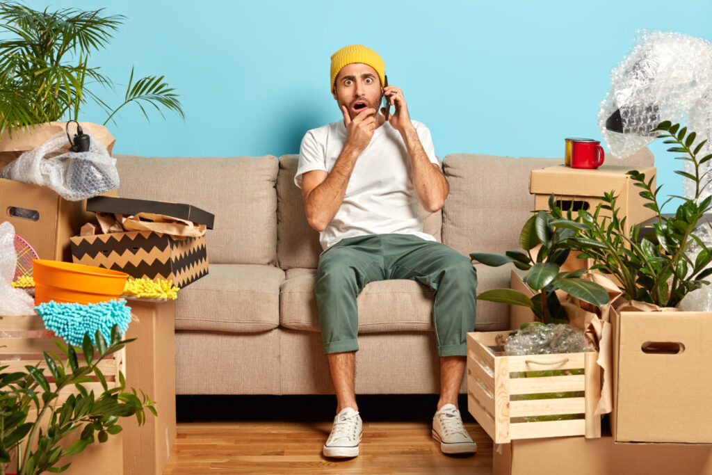 clutter house man guy sofa