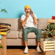 clutter house man guy sofa