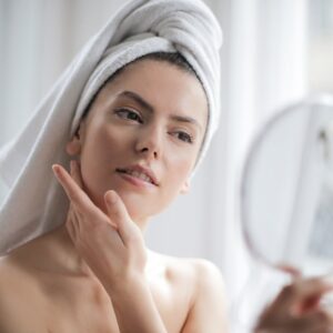 woman mirror skin