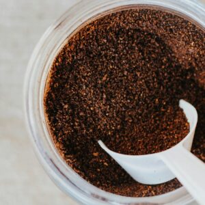 white table spoon on coffee
