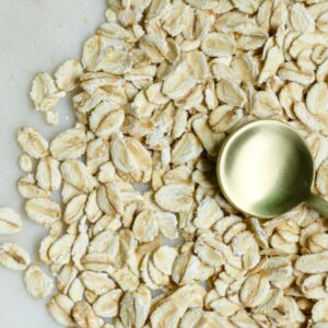 brown rice on white textile