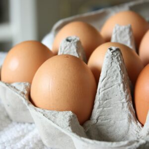 brown egg on white paper towel