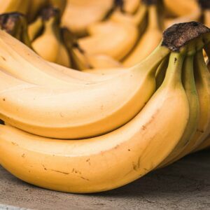 a bunch of bananas sitting on top of a table
