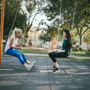 woman sitting on swing