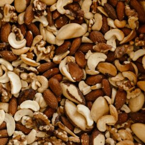 a mixture of nuts and nutshells in a bowl