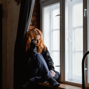 woman window depressed