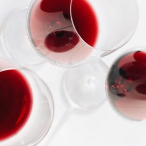 clear wine glass with red wine