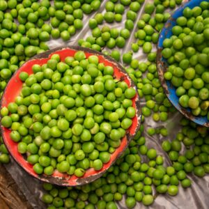 a group of baskets full of green grapes